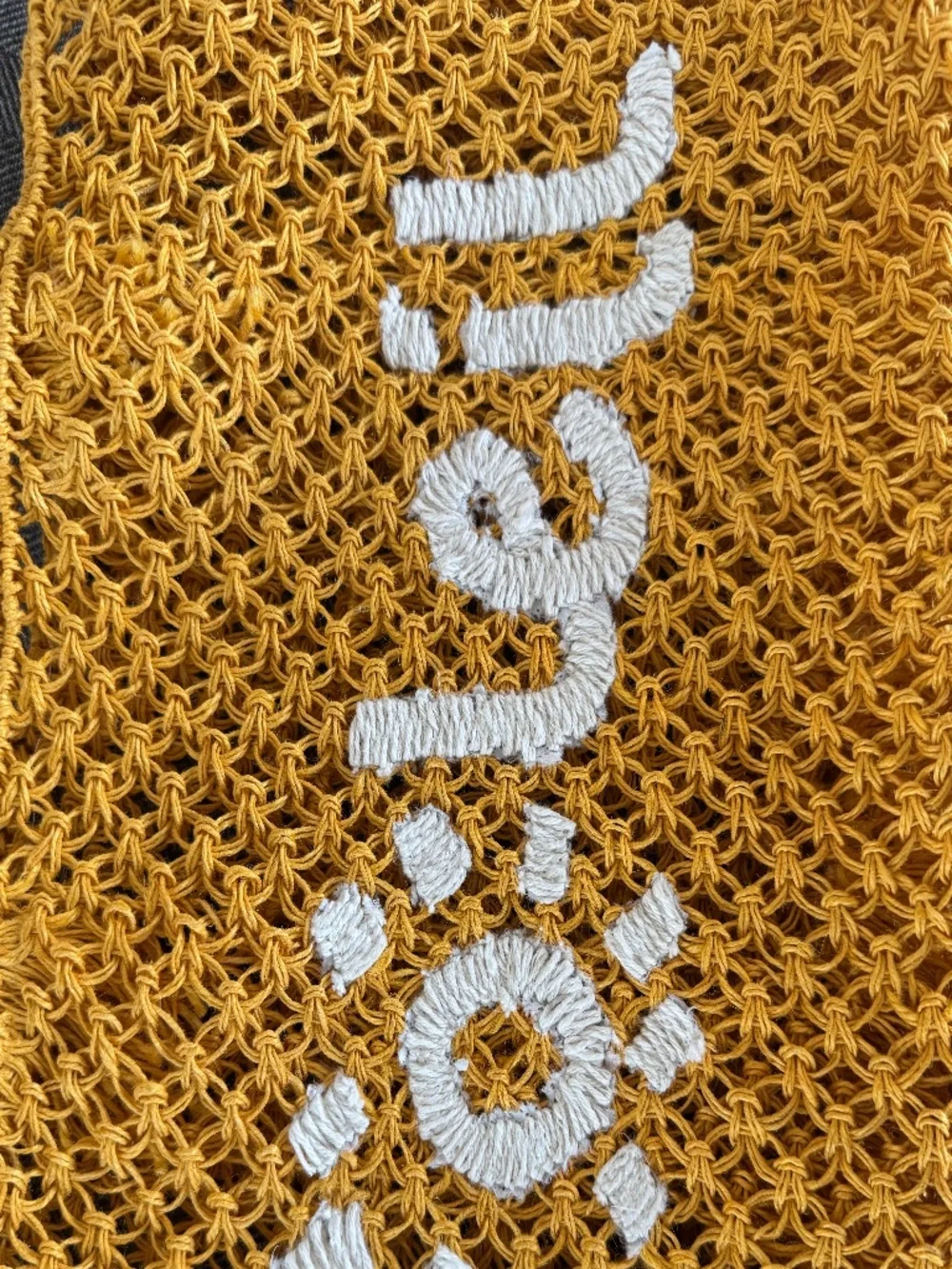 NWOT, RAFFIA WOVEN TOTE WITH DARLING “SOLEIL”